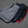 Mens Gym Training Shorts Men Sports Casual Clothing Fitness Workout Running Grid quick-drying compression Shorts Athletics259R