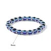 Urok bransoletki 8 mm 10 mm Blue Evil Eye Bransoletka Turcja Oczy życzenia ręcznie robione damskie żywice z koraliki Brzeczenie Elastyczne bransoletki Biżuteria DEL DH3D2