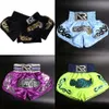 Män kvinnor boxning mma shorts barn muay thai sanda träning stammar pojkar flickor kickboxning sport shorts kampsport boxeo byxor x0216s