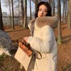 Korki damskie płaszcze średniego stylu parki dla kobiet z kapturem luźna moda 2023 Zima swobodna noszenie śniegu ciepła samica solidna