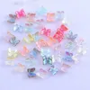 Décorations d'art d'ongle 100pcs / lot Aurora Butterfly Charm 6mm Ice Fantaisie Papillons 3D Ailes Strass Partie