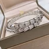 Bangle Europese sieraden 925 sterling zilver zirkoon elastische snake bone armband dames high-end fashion luxe merk party 231031