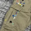 Jeans masculins High Street Cargo Flare Pant Hip Hop Handmade Ink Big Pocket Pocket Cotton Pants 231031