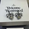 مصمم قلادة Viviane Viviennes Westwoods Jewelry Titanium Black Bow Cnot أقراط للنساء الحلو والبارد الشعبي Titanium Gold Rope Heart