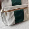 Tuval sırt çantası unisex omuz çantaları lüks tasarımcı kemer çantası moda sırt çantaları cümans okul paketi yüksek kaliteli kitap geri paketleri stil seyahat büyük kapasiteli çanta