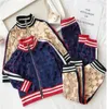 Traccia per bambini Designer Tracksuit da due pezzi Set ragazzi ragazze Stampato giacche per top per adolescenti pantaloni casual sport abbigliamento abiti da bambino vestiti di lusso parco 90-140