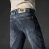 Jeans Gouoi Herren Herbst- und Winterstil Koreanische Mode Elastische Slim Fit Kleine Füße Europäische High-End-MarkenhoseUXYV