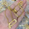 Colares de colares clássicos anéis de pulseira define o padrão de meandros da Grécia Banshee Medusa retrato 18K Gold Bated New Designer Jewelry Bdgh