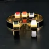العلامة التجارية العلامة التجارية الجديدة 316L Titanium Steel Fashion Ring المينا من أربعة ألوان الرجال والنساء رسالة العلامة التجارية الأصلية رنين المجوهرات الهدية لا صندوق 184V
