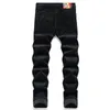 Zwarte corduroy brief geborduurde jeans slank fit stretch heren casual broek herfst winter denim broek mode streetwear