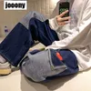 Męskie dżinsy mężczyźni Patchwork wielonośnikowy pary dżinsowe spodnie żebrakowe spodnie towarowe High Street Casual Male Streetwear 220902