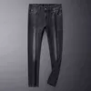 Designer di jeans da uomo stampato autunno grigio nero stampaggio tridimensionale lavaggio gatto barba pantaloni casual stile high-end R981