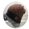 Cappello lavorato a maglia di lusso Berretto da berretto da uomo Cappelli aderenti da uomo Unisex per lettere a quadri in cashmere Stampa Cappellini con teschi casual Moda all'aperto Alta qualità 5 colori