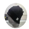 Cappello lavorato a maglia di lusso Berretto da berretto da uomo Cappelli aderenti da uomo Unisex per lettere a quadri in cashmere Stampa Cappellini con teschi casual Moda all'aperto Alta qualità 5 colori