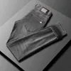 Foncé 2022 gris haut de gamme jean hommes marque de mode automne et hiver élastique Slim Fit petits pieds épais pantalon hommes