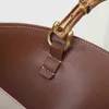 新しい高品質レザー大型バケツバッグキャラメルカラーレトロ女性竹ハンドルハンドバッグレディバッグファッションキャットウォーク女性のバッグ 2022