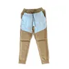 Tasarımcı Çiftler Ceket Trailtsuit Pantolon Longe Baskı Logosu Birleştirme Sıradan Spor Pantolonları Özel Kumaş Gevşek Sokak Moda Çift Stil Tech Tech Polar