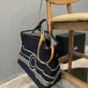 Bolsos de hombro de diseñador Bolsa de compras Bolsos de lujo para mujer Bolsos de mezclilla lavados vintage Bolso de mano Verano Playa grande Viajes Cruz Cuerpo S