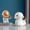 Figurine decorative Decorazione per la casa Astronauta Ornamento per la conservazione Soggiorno Scrivania Vassoio portaoggetti per caramelle Camera creativa Spaceman Piggy Bank Accessory