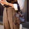 2022 패션 디자이너 미니 월 버킷 가방 여성 버킷 백 트레저 핸드백은 드로 스트링 및 금속 로고 엠블리스 289Y와 함께 제공됩니다.