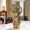 Decoratieve objecten Figurines Creatief keramisch paar beeldhouwkunst Home Decoratie Dressoir Art Kleine ornament Decoratie Craft Goud en zilveren paar Gift T220902