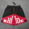 22FW NOWOŚĆ HIP-HOP Rhude Shorts Mężczyźni Kobiety 1 1 Wysokiej jakości Rhude Umyj czarne czerwone splicing Siatki Breczesy