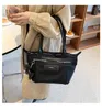 Tassen 2023 Autumn en Winter Nieuwe Black Knight Dumpling Bag Vrouw Summer Cool Sa Minderheid Draagbare Sling Single Shoulder Cross Cars Portemonnees Verkoop