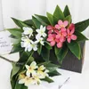 Dekorativa blommor konstgjord blomma lång stam frangipani grenar inomhus hem vardagsrum bröllop gröna falska växter