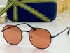 Okulary przeciwsłoneczne dla kobiet i mężczyzn Summer 0562 Style anty-ultrafiolet retro płyta pełna rama okulary losowe pudełko