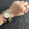 패션 브랜드 손목 시계 여자 여자 크리스탈은 다이얼 스타일 스틸 메탈 밴드 쿼츠 시계를 회전시킬 수 있습니다. p18240d