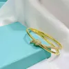 Bracelet à double ligne Bangle Knot Women039s Sterling Silver Minority High Sense Gold Couple Men039s mode249C2435035