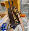 Top -Qualit￤t Designer -Taschen echte Lederhandtasche Frauen Handtaschen Crossbody Soho Bag Disco braune Blumenumh￤ngetaschen Bote Tasche Geldb￶rse Brieftasche 21 cm