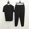 남성용 트랙 슈트 럭셔리 세트 Summe Loose Loose Tracksuit 야간 장면 두개골 브랜드 드릴링 O-Neck 티셔츠 바지 고품질 남성용 짧은 슬리브