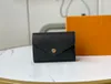 Carteiras de designer de luxo de alta qualidade bolsa de moda curta vitorine carteira impressão em duas cores carta clássico pallas titular do cartão zippy