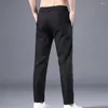 Calça masculina masculina elegante calça de fundo esbelto de fundo casual colorido puro estilo coreano