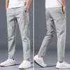 Мужские брюки стильные повседневные мужские мужские карманы для талии корейский стиль средние брюки