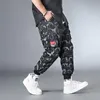 Erkek pantolon hip hop sokak kıyafeti karakter baskı pantolon erkekler büyük kargo eşofmanları erkek jogger pantolon artı szie 6xl 7xl