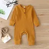 Rompers 018m unisex doğumlu erkek bebek kız düğmesi romper toddler pamuklu düz renkli örgü şerit uzun kollu tulum bebek giyim 220905