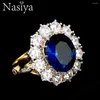 Eheringe Nasiya Design Romantischer Luxusring Goldene Farbe mit 10x12mm großen ovalen Saphir-Edelsteinen Mode feiner Schmuck Großhandel
