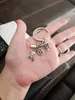 1 Piece Keychain Baby Stroller Bottle Key Ring Cute Shoes Mother'S Cradle Theme Mother'S Day Souvenir Jewelry