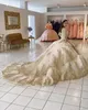 2022 Champagne Quinceanera Robes Paillettes Dentelle Appliques Perles De Cristal À Plusieurs Niveaux Manches Longues Chapelle Train Puffy Ball Robe De Soirée De Bal Robes De Soirée