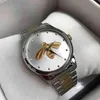 Relógios de pulso amantes casais estilo clássico padrões de abelha relógios 38 mm 28mm Caso de prata masculino Mulheres Designer Quartz