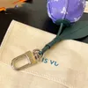 Lettre de portefeuille de clés en cuir limité bacs de sacs de fleuris