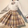 Set di abbigliamento Sorella morbida giapponese JK College Camicia con colletto per bambola a vento Gonna a pieghe scozzese Busto Abito uniforme Donna Autunno