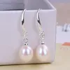 Natürliche Süßwasserperlenpearl -Pearl -Ohrringe sind modisch und vielseitig. Einfache reine Silberohrhaken Geschenk für Frauen Schmuck