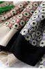 Двух кусочков французский винтажный жаккардовый вязаный костюм Женщины контрастные цвета vneck vneck single short cortigan mini skirts sets шикарные наряд 220906