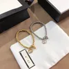 Designer smycken Bangle smycken armband kedja bokstav hänge guld sier charm designer tillbehör kvinnor rostfritt stål länk växel spännen