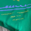 Versione top di design Felpa con cappuccio mano pura GU 2022 autunno e inverno nuovo logo ananas verde stesso maglione da uomo e da donna