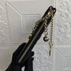 Woman Coin Purse Cowhide Clutch Zipper Passport Bag Caviar Card Bag Grid Pattern Top Luxury Designer Key Chain Buckle Sheepskin Wa184w