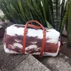 Kahverengi Cowhide Seyahat Çantası ABD Deposu 20pcs çok büyük kapasiteli inek pazen duffel özel tasarım duffle el çantası gece hafta sonu çantalar dom1065